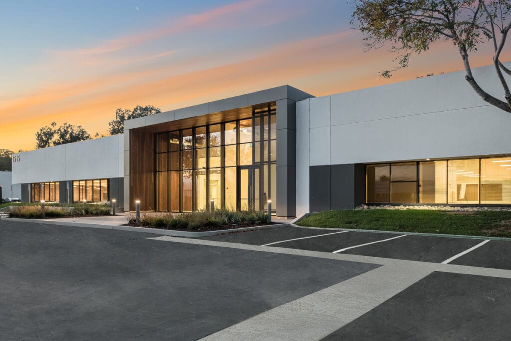 Exterior of modern office park building at twilight